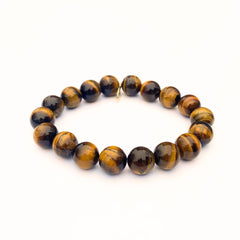 Polished Tiger Eye crystal bracelet with golden sheen - handcrafted healing jewelry by Crystalvana