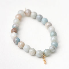 Amazonite healing bracelet with gold charm - natural stone jewelry for communication