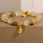 Natural Tiger Eye bracelet wealth beast charm - handcrafted natural crystal jewelry by Crystalvana