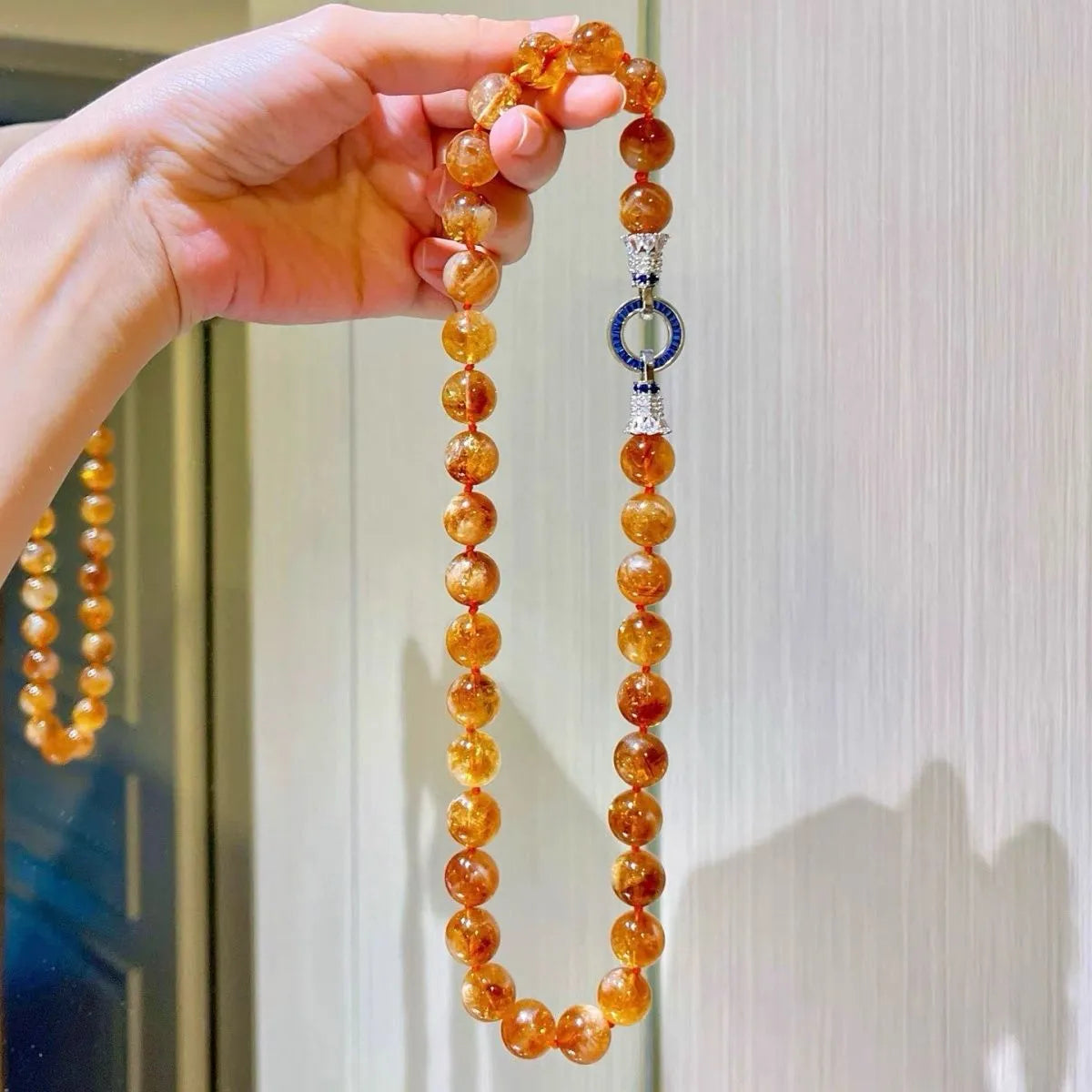 Close-up detail of citrine necklace beads — handcrafted crystal necklace for wealth and abundance by Crystalvana