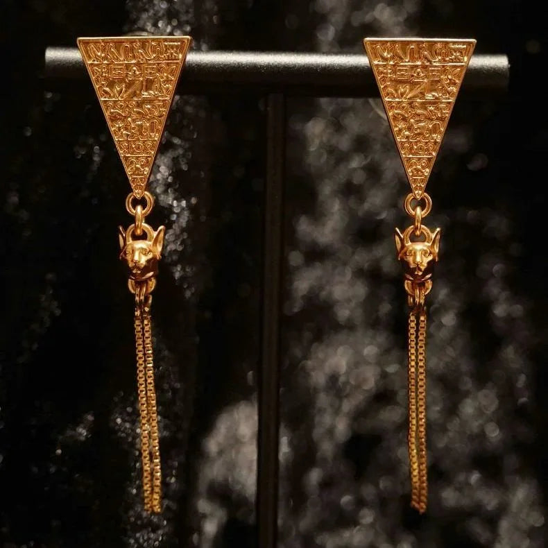 Egyptian Crystal earrings styled on model wrist — natural crystal earrings for positive energy by Crystalvana