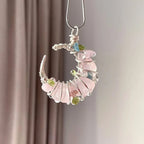 Overhead flat lay of raw crystal necklace — handcrafted crystal necklace for positive energy by Crystalvana