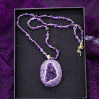 Overhead flat lay of amethyst jewelry set — crystal jewelry gift set for healing and wellness by Crystalvana