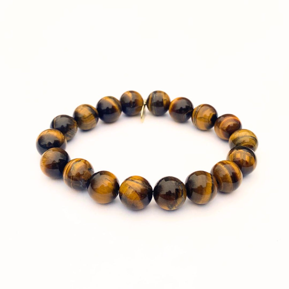 Polished Tiger Eye crystal bracelet with golden sheen - handcrafted healing jewelry by Crystalvana