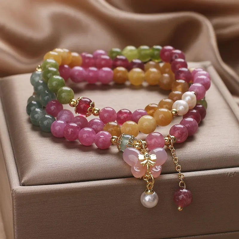Lifestyle shot of tourmaline bracelet worn elegantly — healing crystal bracelet for positive energy by Crystalvana