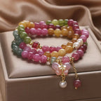 Tourmaline bracelet styled on model wrist — healing crystal bracelet for positive energy by Crystalvana