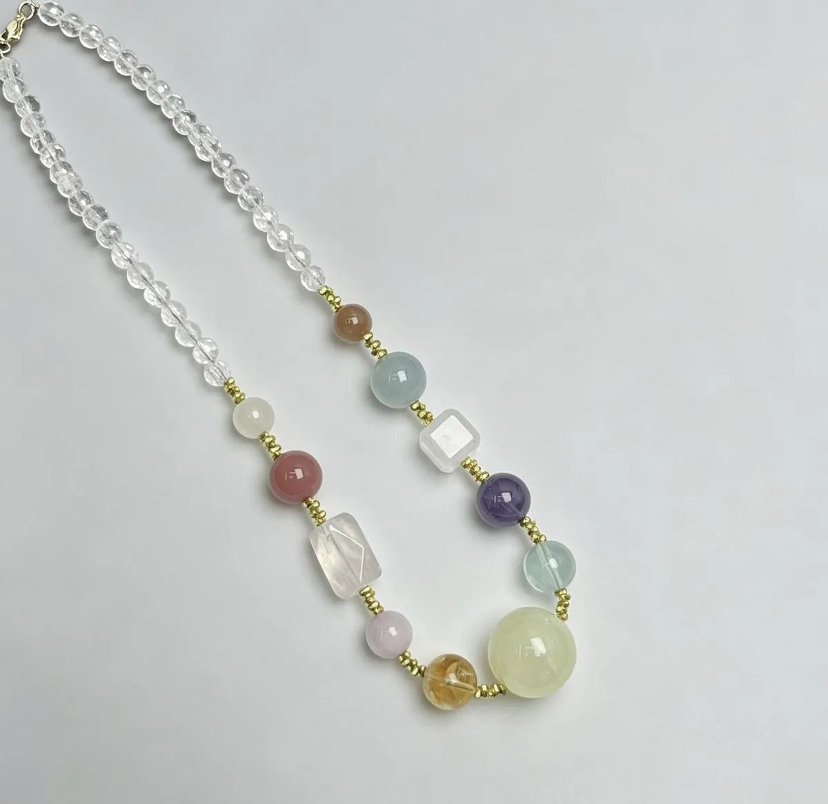 Citrine necklace against natural stone background — handcrafted crystal necklace for positive energy by Crystalvana