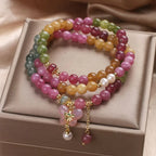 Tourmaline bracelet against natural stone background — healing crystal bracelet for positive energy by Crystalvana