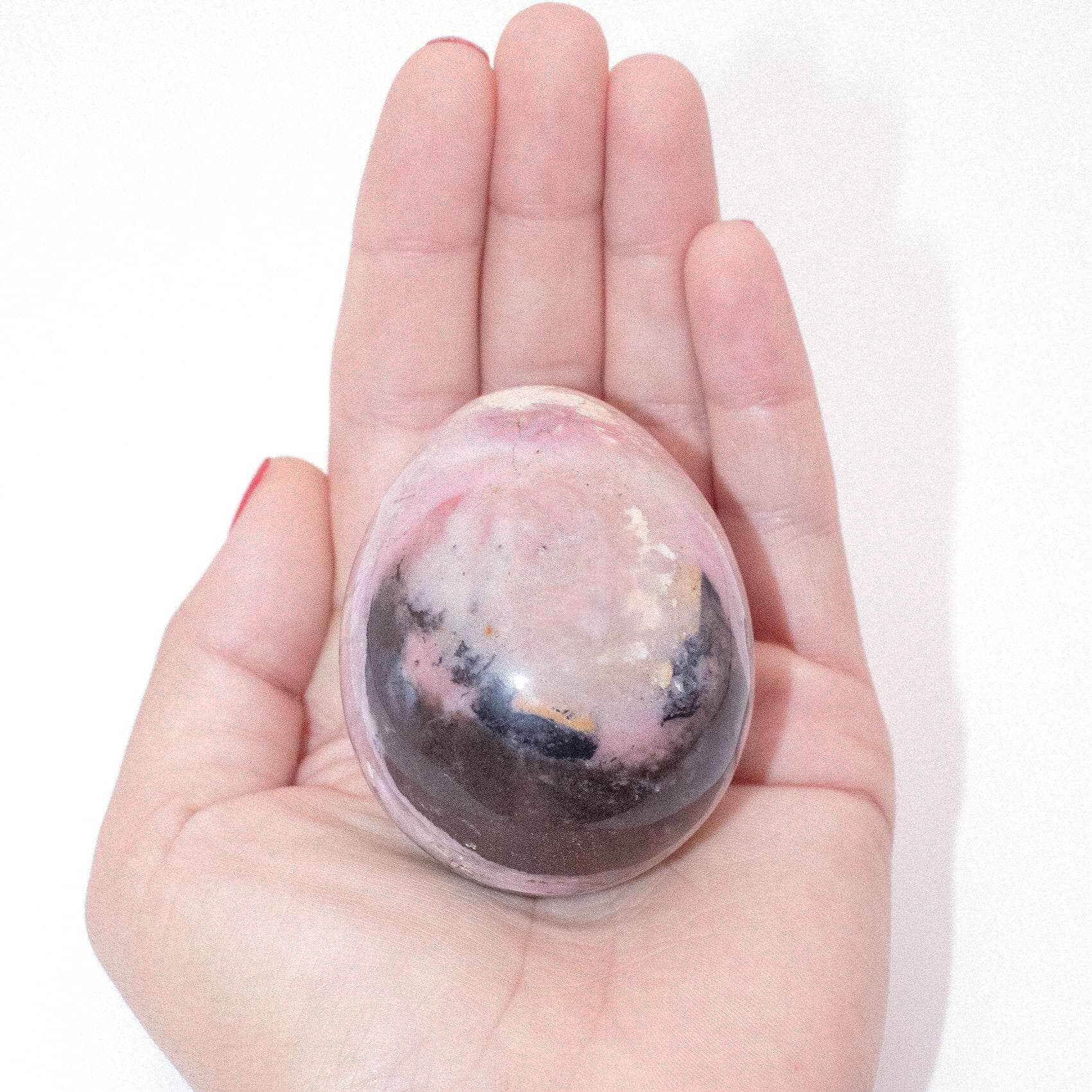 Close-up of Strawberry Opal egg showing intricate color patterns