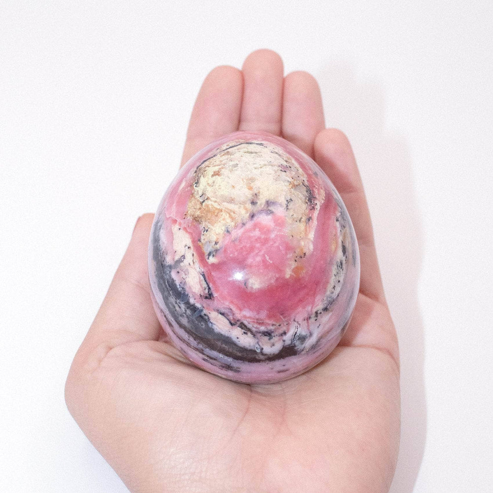 AAA Strawberry Opal egg on display with stunning strawberry patterns