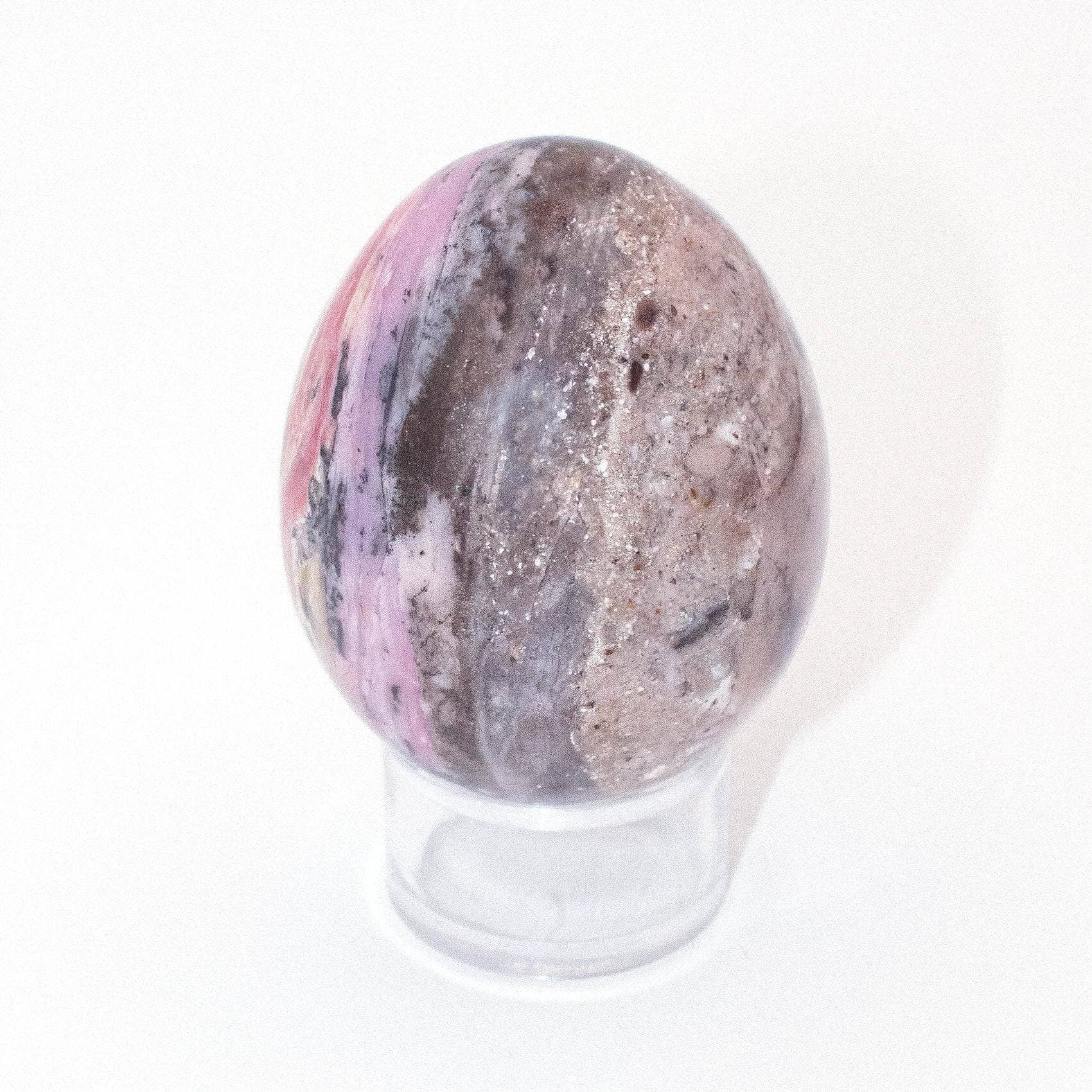 AAA Strawberry Opal egg on display with stunning strawberry patterns