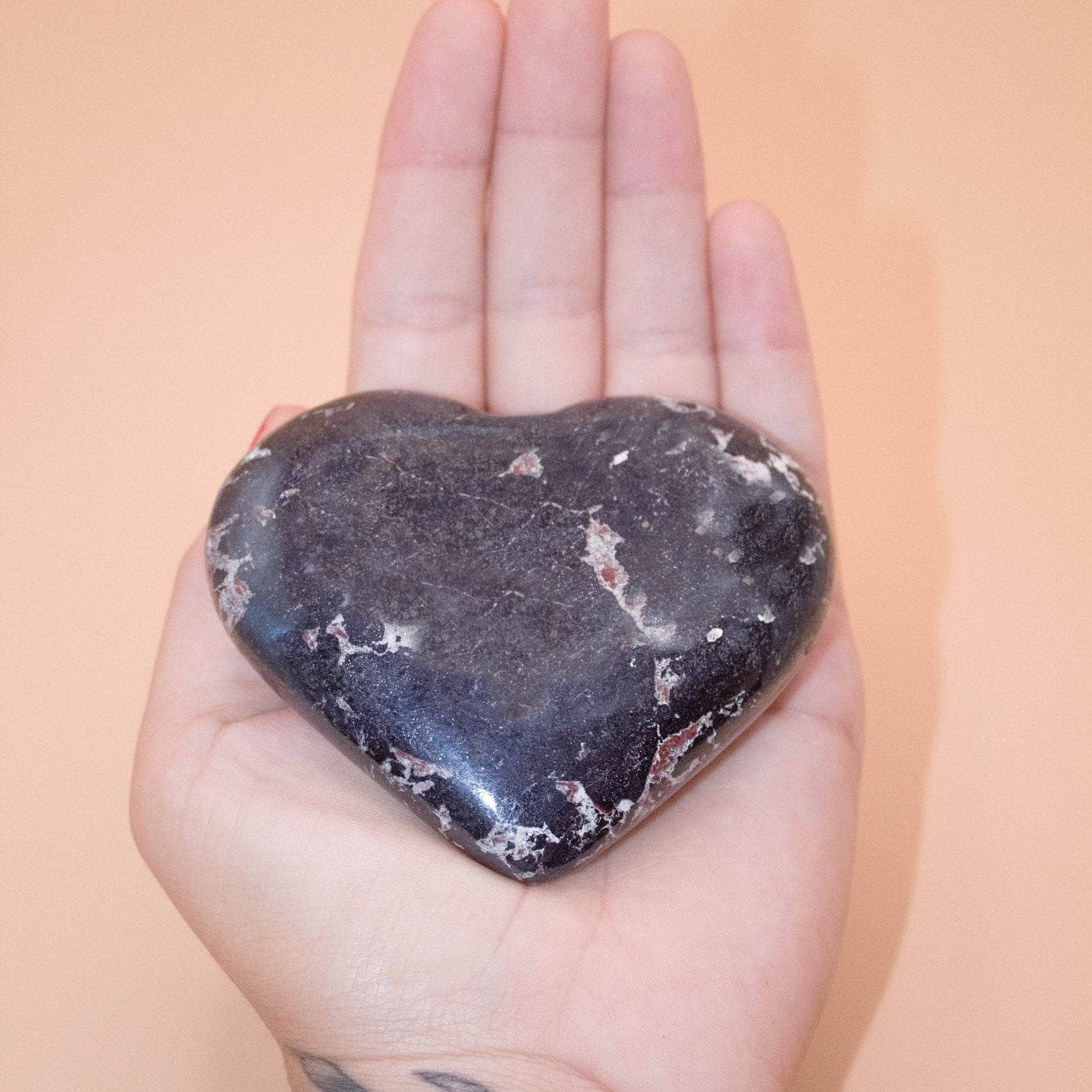 AAA Covellite heart on display with deep wisdom energy