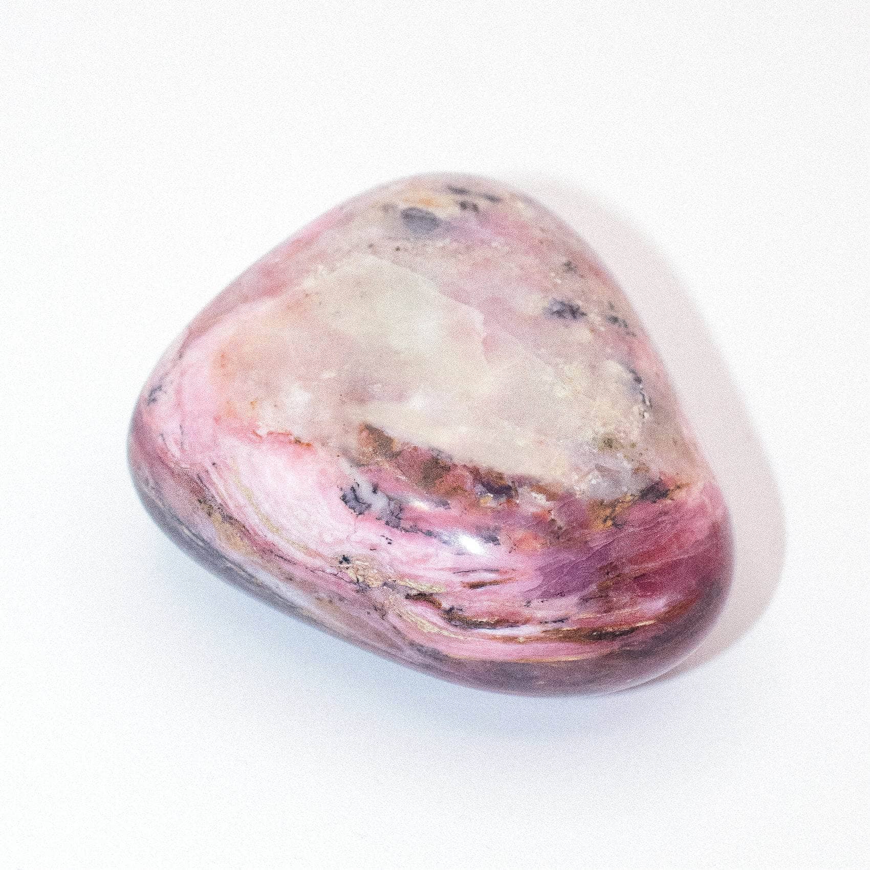 AAA Strawberry Opal palm stone on display with stunning details