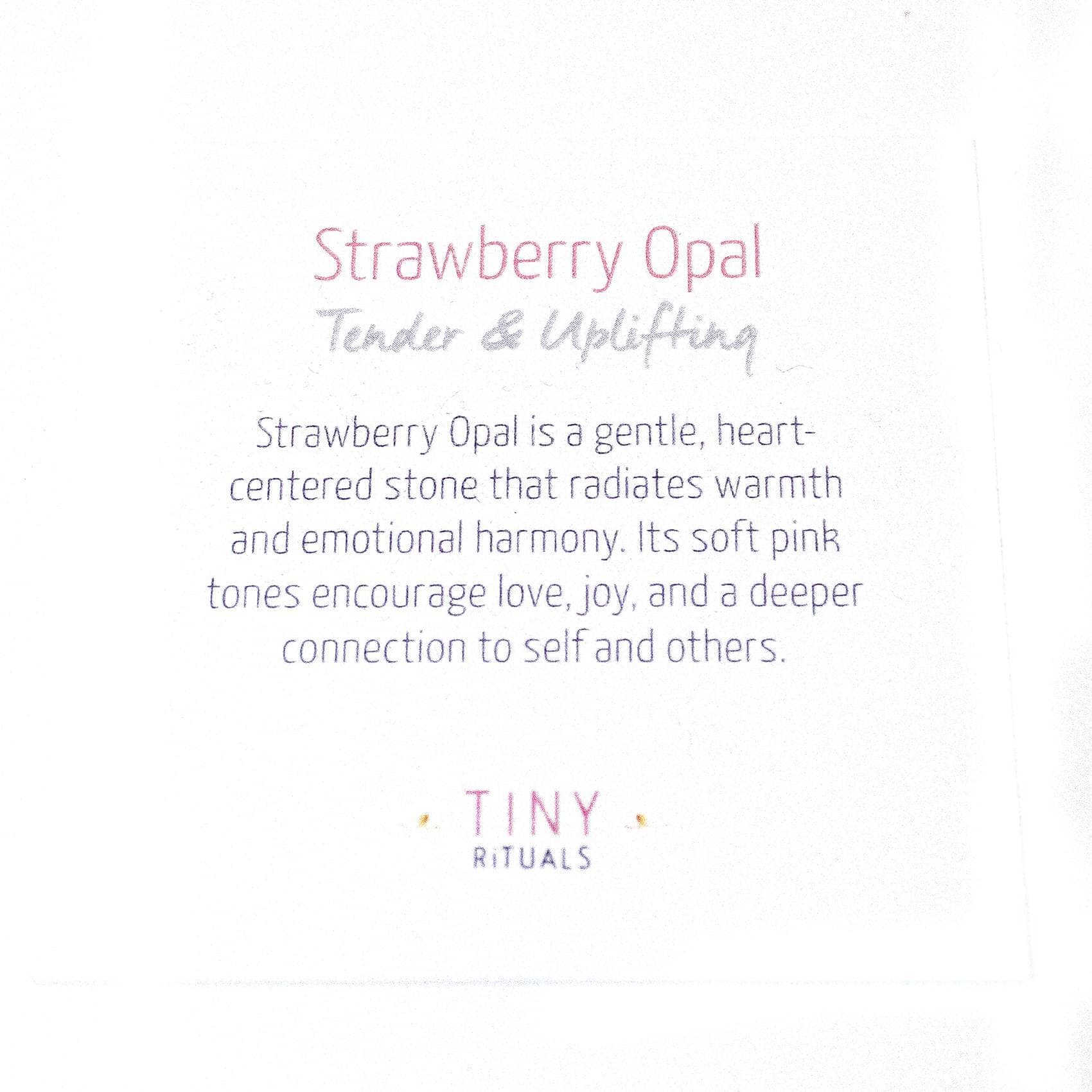 AAA Strawberry Opal palm stone on display with stunning details