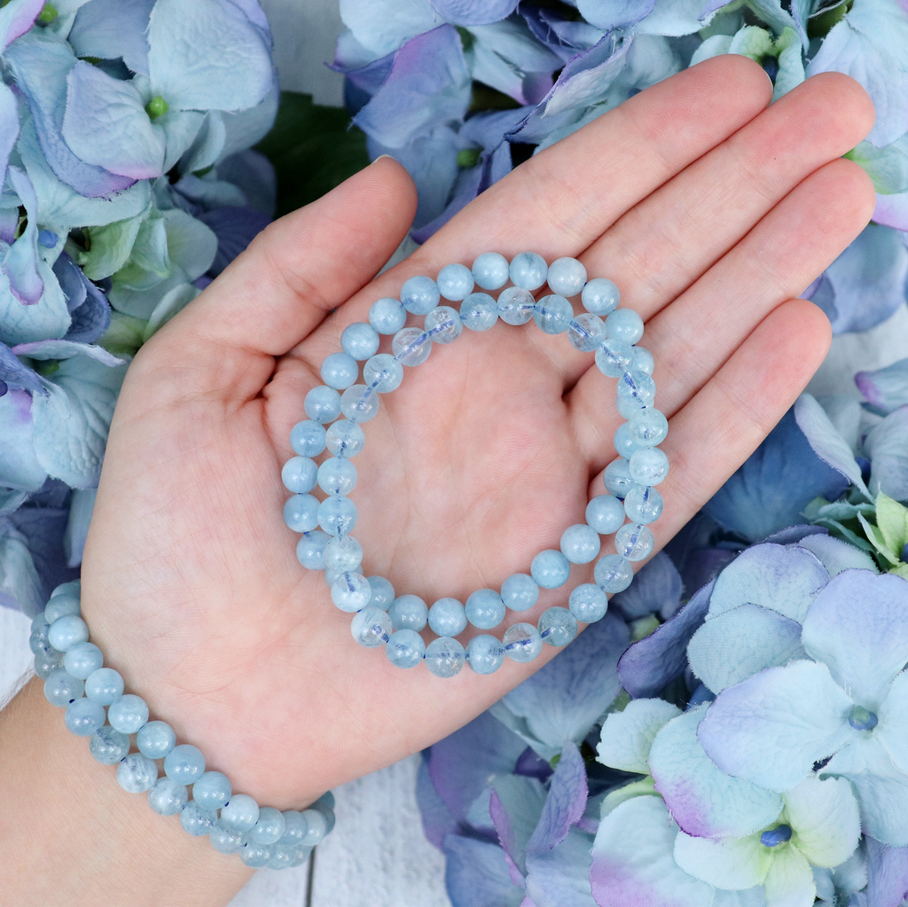 Close-up of natural Aquamarine beads showing colour and pattern