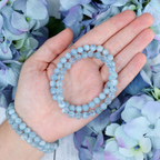 Close-up of natural Aquamarine beads showing colour and pattern
