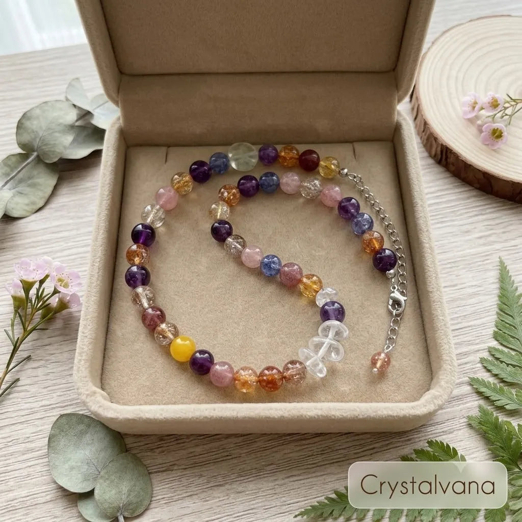 Black Gold Super Seven crystal necklace in gift box showing bead detail with golden rutile inclusions, Crystalvana