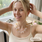 Model smiling wearing Citrine Clear Quartz choker, portrait showcasing necklace beauty, Crystalvana