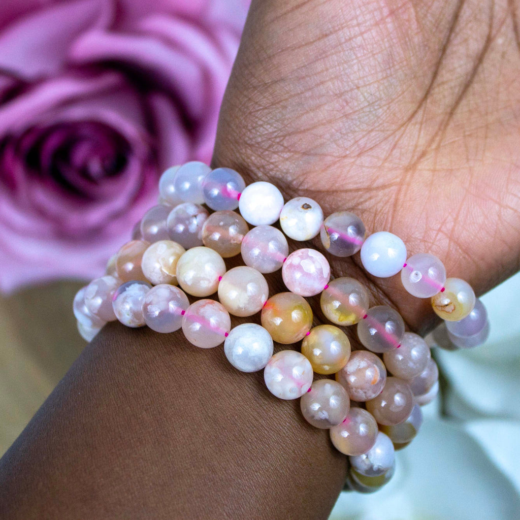 Flower Agate bracelet held against the light