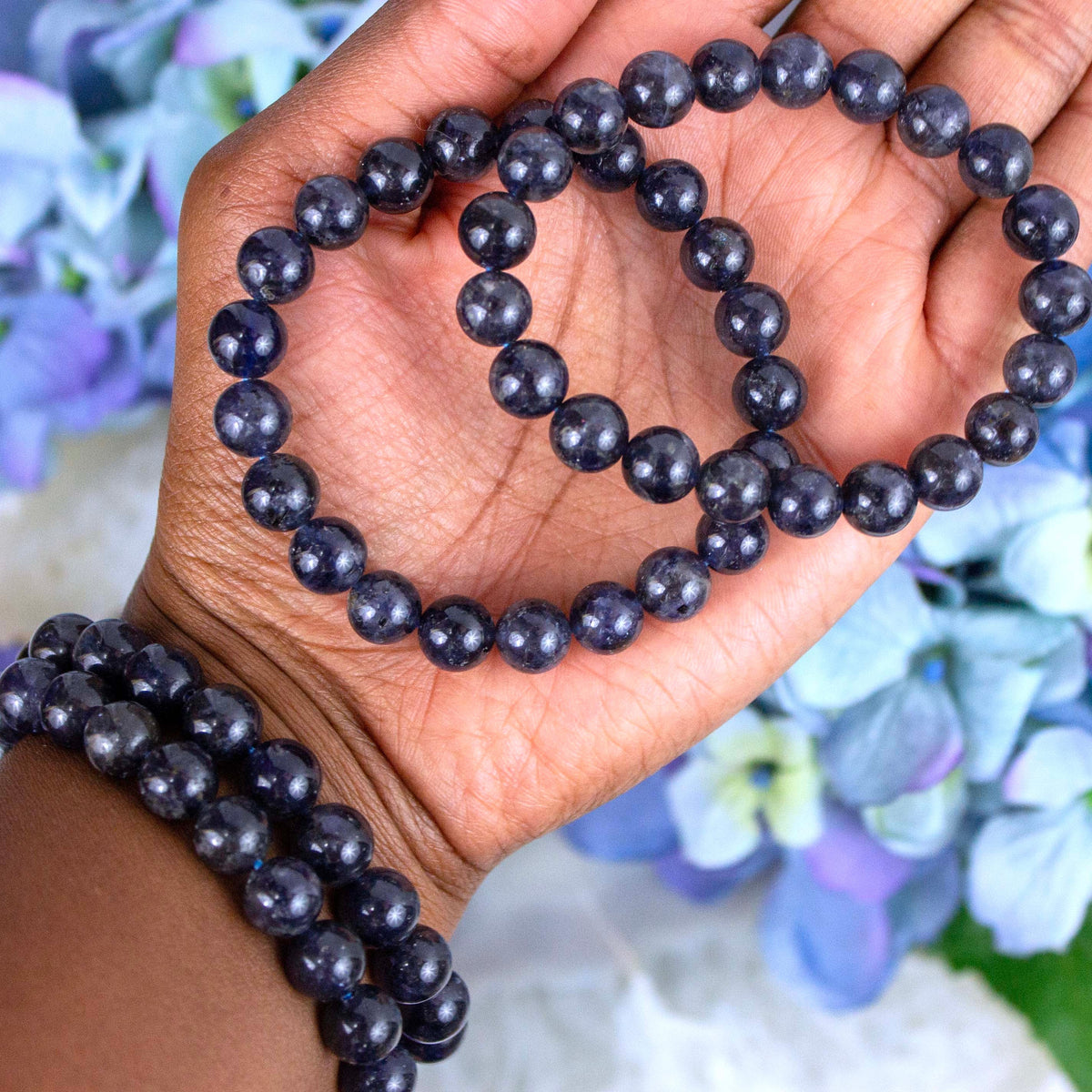 Iolite bracelet worn on the wrist