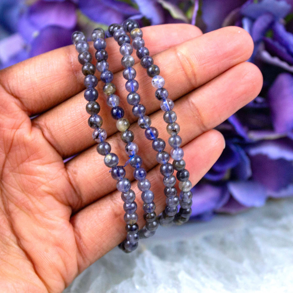 Close-up of natural Iolite beads showing colour and pattern