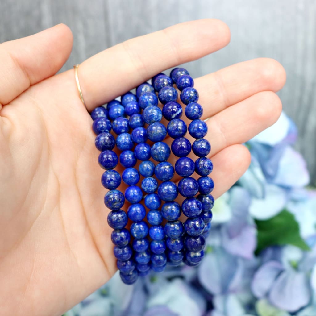 Close-up of natural Lapis Lazuli beads showing colour and pattern