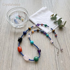 Crystal choker stored in blue velvet pouch, natural gemstone jewelry care and storage, Crystalvana