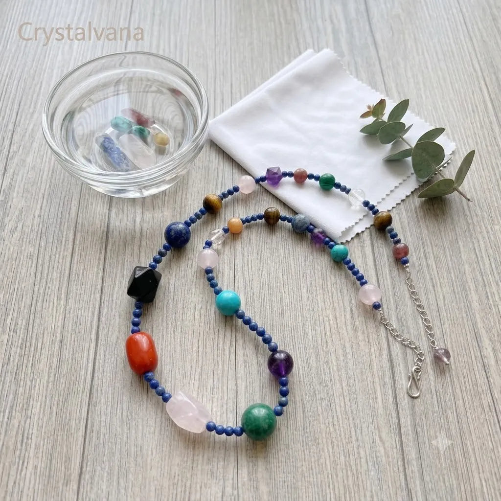 Crystal choker stored in blue velvet pouch, natural gemstone jewelry care and storage, Crystalvana