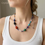 Multi-gemstone crystal necklace paired with white blouse, elegant and versatile styling, Crystalvana