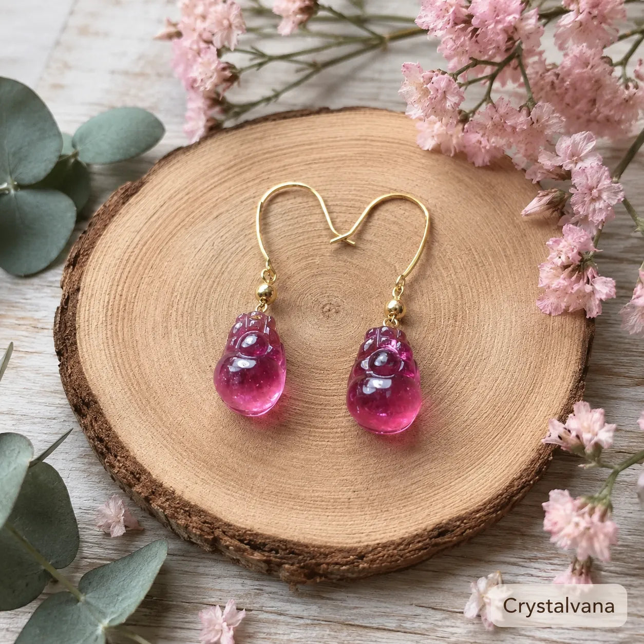 Model wearing natural red tourmaline rubellite earrings blonde ear close-up side profile, Crystalvana