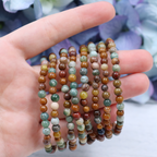 Close-up of natural Ocean Jasper beads showing colour and pattern