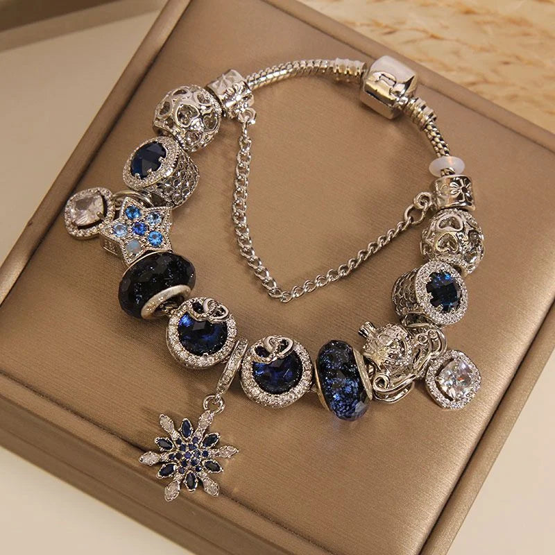 Handcrafted blue starry sky bracelet with snowflake charm crystal jewelry by Crystalvana