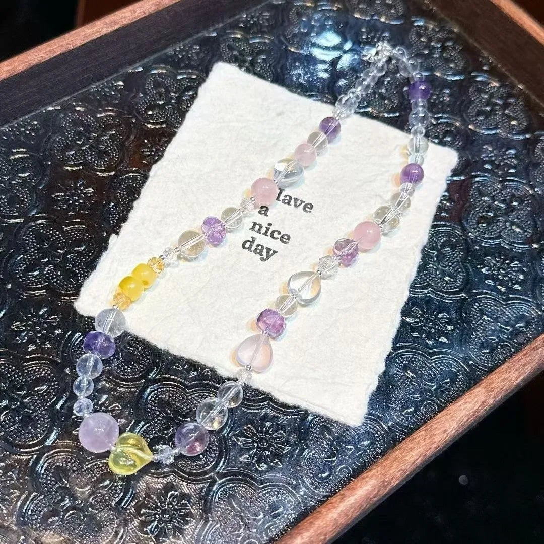 Pastel multi-gemstone crystal choker worn by model at cafe, lifestyle outfit inspiration, Crystalvana