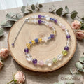 Pastel multi-gemstone crystal choker with amethyst citrine and rose quartz worn by model front view, Crystalvana