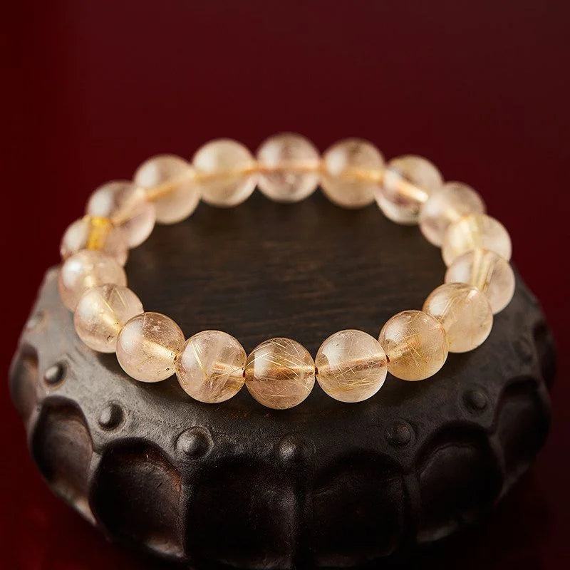 Natural Rutilated Quartz crystal bracelet with golden inclusions for manifestation, Crystalvana