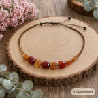 Model smiling hand on hair wearing natural red agate choker necklace, Crystalvana