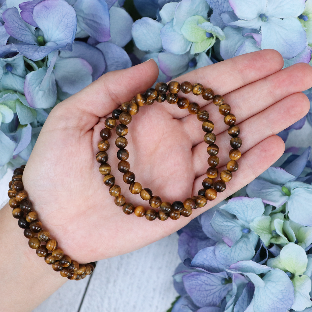 Close-up of natural Tiger's Eye beads showing colour and pattern