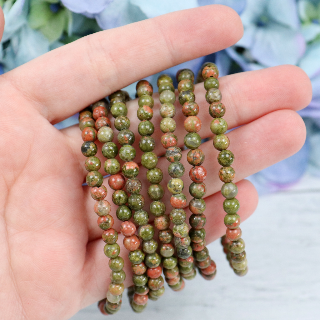 Close-up of natural Unakite Jasper beads showing colour and pattern